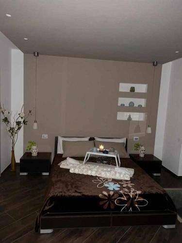Ένα ή περισσότερα κρεβάτια σε δωμάτιο στο Al centro exclusive apartment