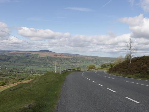 an empty road in the middle of the hills at The Cwtch in Abergavenny