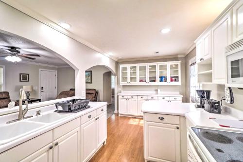 a kitchen with white counters and white cabinets at Charming Retreat Less Than 2 Mi to Cranfield Marina! in Mountain Home