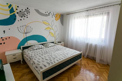 Ένα ή περισσότερα κρεβάτια σε δωμάτιο στο BeeStrick Apartment - Charming and Spacious