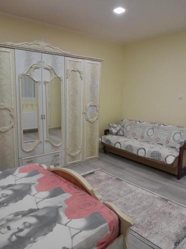 Postel nebo postele na pokoji v ubytování Apartman Tina