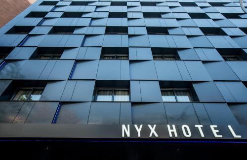 a view of the facade of a ny hotel at NYX Hotel Madrid by Leonardo Hotels in Madrid