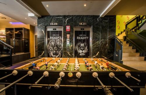 a game room with a foosball table at NYX Hotel Madrid by Leonardo Hotels in Madrid