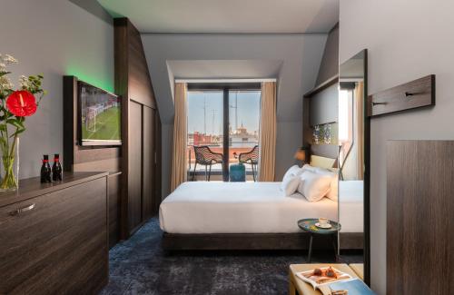 Postel nebo postele na pokoji v ubytování NYX Hotel Madrid by Leonardo Hotels