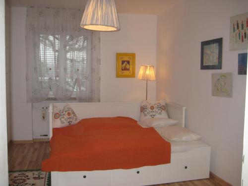 Tempat tidur dalam kamar di Ferienwohnung Fritz