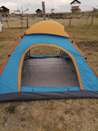 a tent sitting in the middle of a field at Pachingo Tatacoa Desert in La Victoria