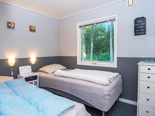 Postel nebo postele na pokoji v ubytování Holiday home Toftlund XXXVIII