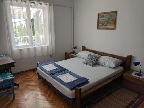 Posteľ alebo postele v izbe v ubytovaní Apartments with a parking space Selce, Crikvenica - 15244