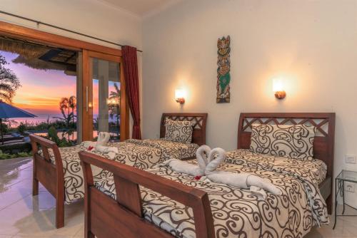 Кровать или кровати в номере The North Cape Beach Villas