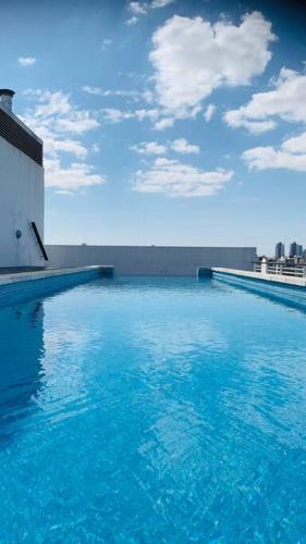 The swimming pool at or close to Modern Studio close to Ave 9 de Julio