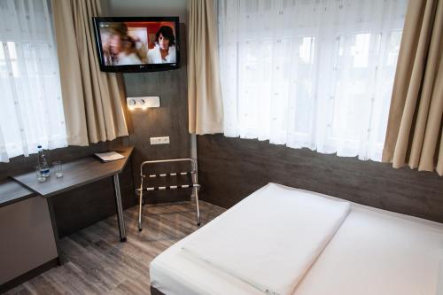Amalienburg - Boutique & Boarding Hotelにあるベッド