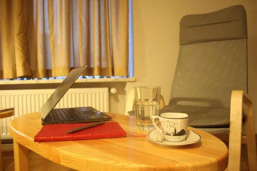 
a table with a knife and a coffee mug on it at TownHouse Istanbul in Istanbul
