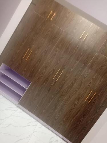 a close up of a wooden floor in a room at Captivating 1-Bed Studio in Sapele in Sapele