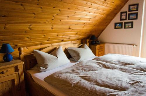 Postel nebo postele na pokoji v ubytování Ferienhaus Seewiefken