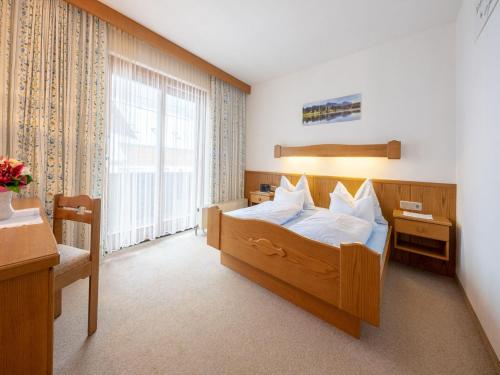 Posteľ alebo postele v izbe v ubytovaní Pleasant Apartment in Bad Kleinkirchheim with Ski Room