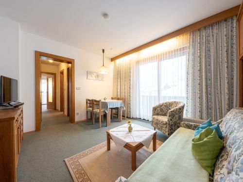 Posedenie v ubytovaní Pleasant Apartment in Bad Kleinkirchheim with Ski Room