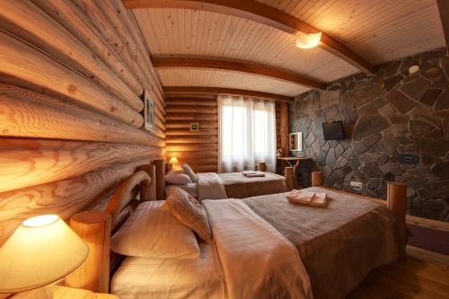 Postel nebo postele na pokoji v ubytování Hotel Bereg