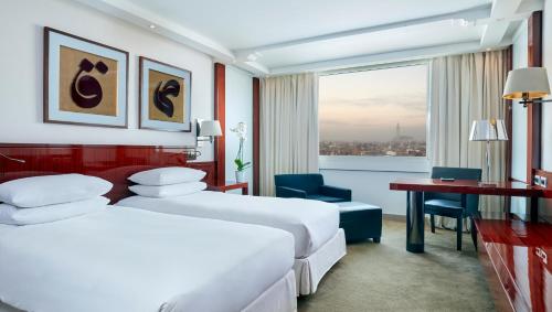 Postel nebo postele na pokoji v ubytování Hyatt Regency Casablanca