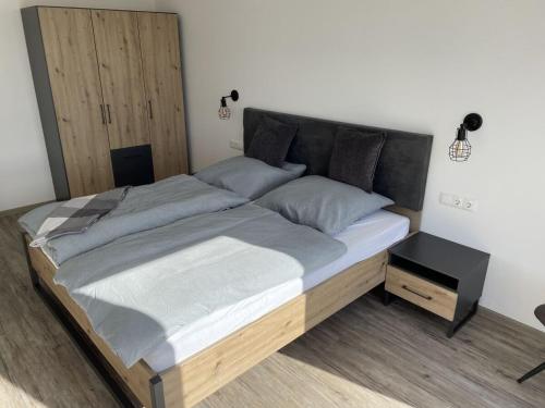 Postel nebo postele na pokoji v ubytování Meerzeit Ferienwohnung Fehmarn
