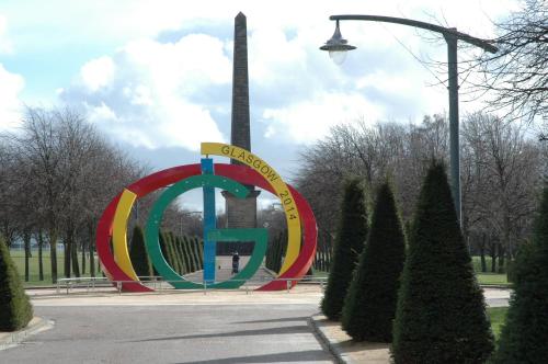a large sign in the middle of a park at The Nelson - Spacious City Property and Free Parking in Glasgow
