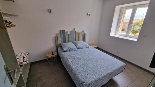 Posteľ alebo postele v izbe v ubytovaní Résidence du Portail d'Avail