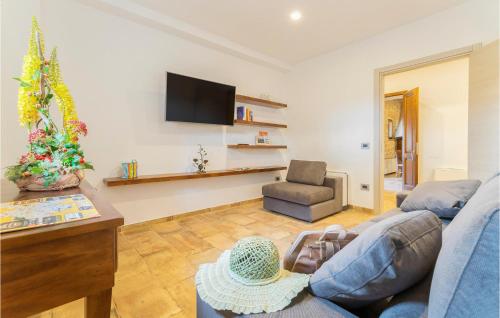 Μια τηλεόραση ή/και κέντρο ψυχαγωγίας στο Beautiful Home In Passignano Sul T