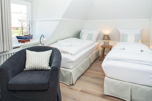 Ένα ή περισσότερα κρεβάτια σε δωμάτιο στο Austernblick