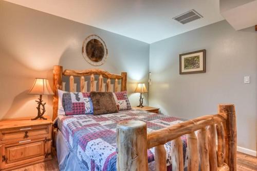 a bedroom with a wooden bed and a wooden dresser at MTN Town Escape-Beavers Den, 1 Bdrm luxury Apt in Green Mountain Falls