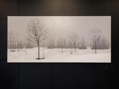 a black and white picture of trees in the snow at Tabist THE GREEN ASAHIKAWA in Asahikawa