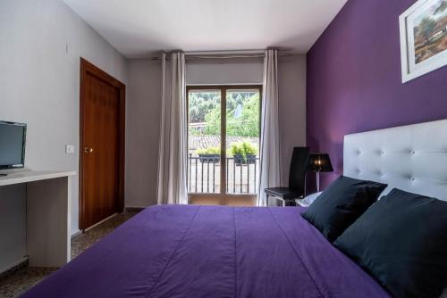 Postel nebo postele na pokoji v ubytování Hotel Marrodan Arnedillo