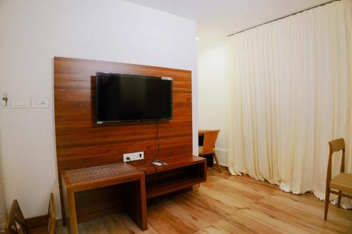 TV a/nebo společenská místnost v ubytování Emarald Resort