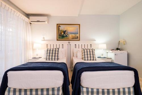 Ένα ή περισσότερα κρεβάτια σε δωμάτιο στο Flamingo Rocks