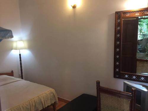 Ein Bett oder Betten in einem Zimmer der Unterkunft Hotel Shalini