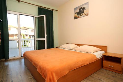 Postel nebo postele na pokoji v ubytování Apartments and rooms with parking space Mrljane, Pasman - 299