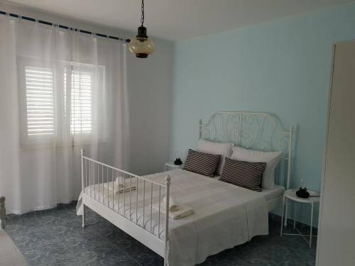 Postel nebo postele na pokoji v ubytování Apartments with a parking space Orebic, Peljesac - 264