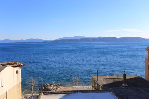 a view of the ocean from a building at Apartments by the sea Igrane, Makarska - 311 in Igrane