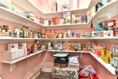 a shop with shelves filled with food and other items at Walcot Hall - Stunning Stately Home set in 27 acres of parkland and sleeping 16+ in Alkborough