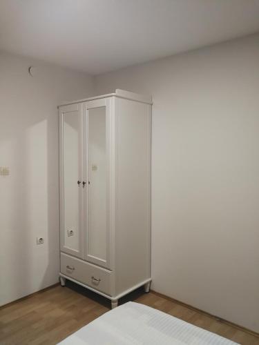 Ένα ή περισσότερα κρεβάτια σε δωμάτιο στο Apartment Smoljanac 14979b