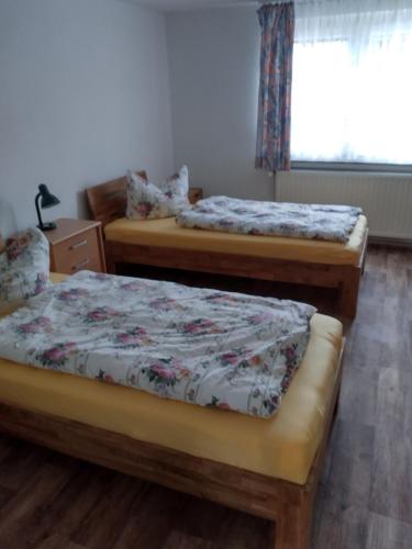 Postel nebo postele na pokoji v ubytování Ferienwohnung Charlotte