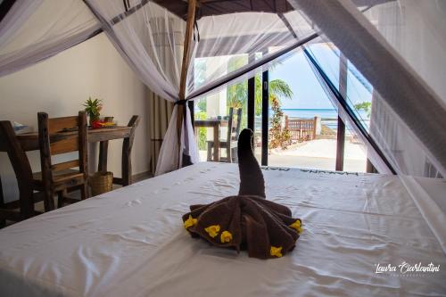 Letto o letti in una camera di Uroa Zanzibar Vera Beach Hotel by Moonshine