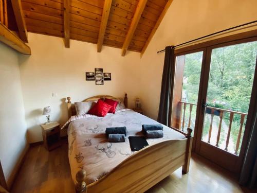 Postel nebo postele na pokoji v ubytování Ecrins Lodge