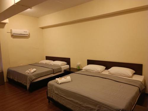 Ein Bett oder Betten in einem Zimmer der Unterkunft SO Hotel