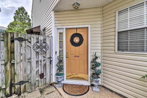 a front door of a house with a fence at Hampton Home with Fireplace and Close to Beaches! in Hampton