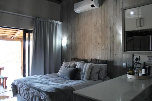 Ένα ή περισσότερα κρεβάτια σε δωμάτιο στο Sharon Lodge