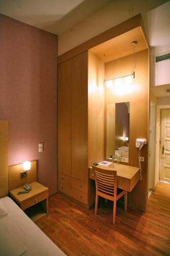 Postel nebo postele na pokoji v ubytování Sandy Bay Hotel