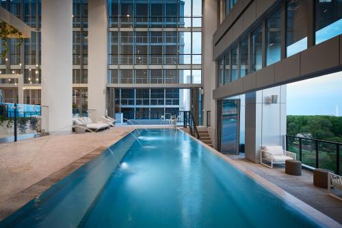 a large swimming pool in the middle of a building at Sentral Michigan Avenue in Chicago