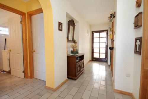 a room with a hallway with a mirror and a door at Apartments with a parking space Vrbnik, Krk - 429 in Vrbnik