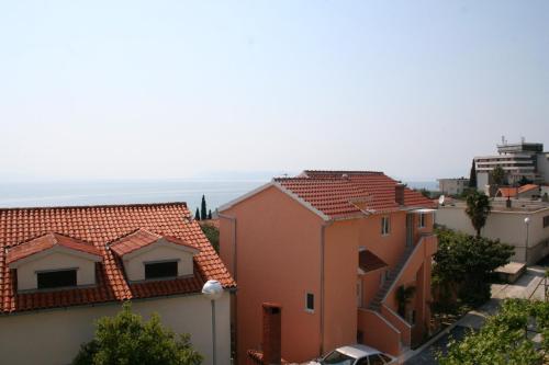 a view of some houses in a city at Apartments by the sea Podgora, Makarska - 518 in Podgora
