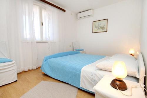 Posteľ alebo postele v izbe v ubytovaní Apartments by the sea Vrboska (Hvar) - 541