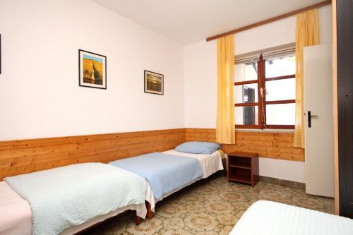 Posteľ alebo postele v izbe v ubytovaní Seaside secluded apartments Lavdara, Dugi otok - 433